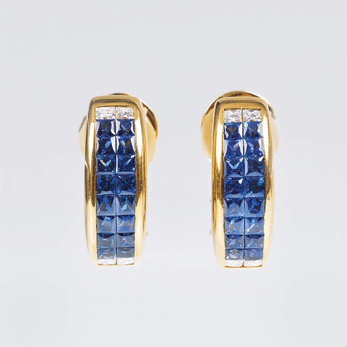 A Pair of fine Sapphire Diamond Earclips