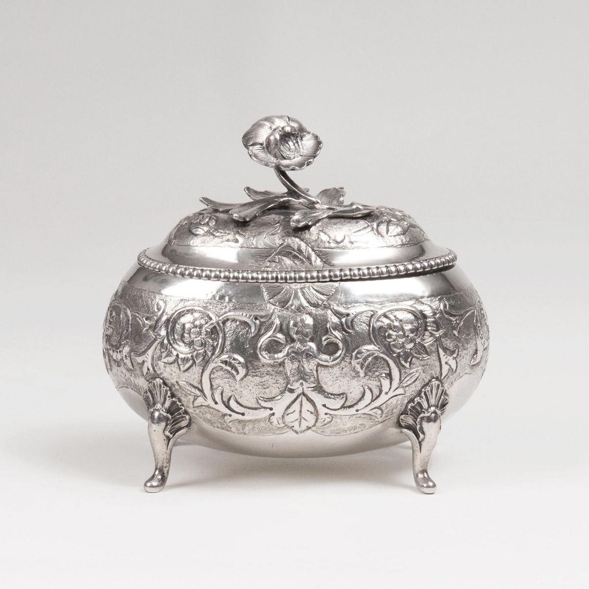 A Rococo Sugar Bowl with floral knob
