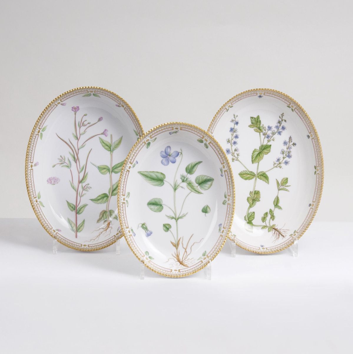 A Set of 3 oval Flora Danica Bowls with Botanical Specimens