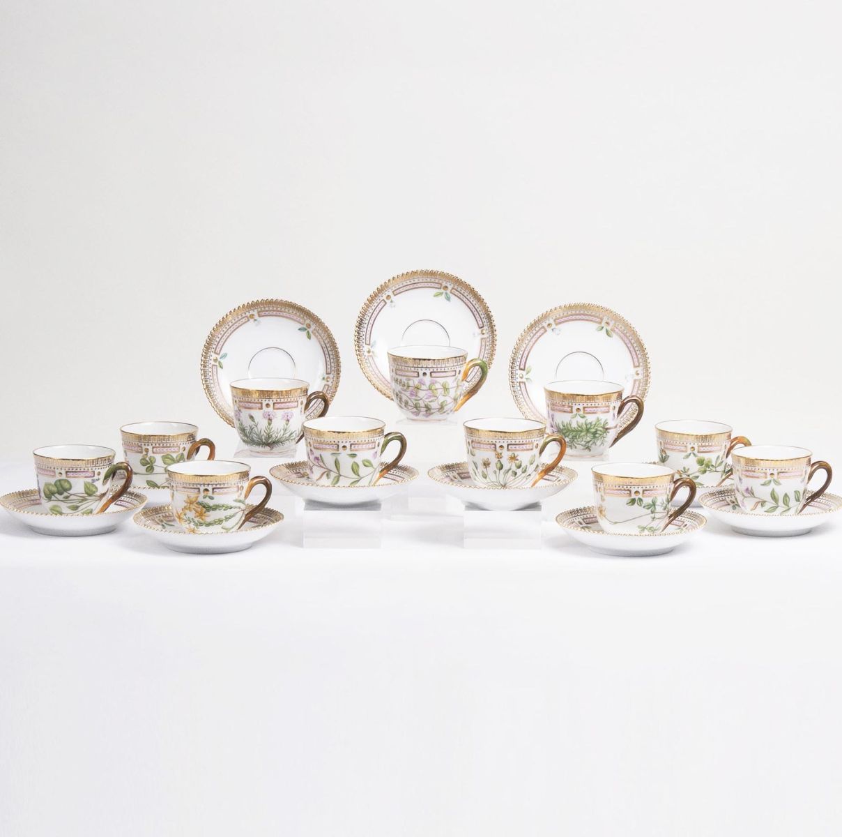 A Set of 11 Flora Danica Moccha Cups with 12 Saucers A Set of 11 Flora Danica Moccha Cups with 12 Saucers