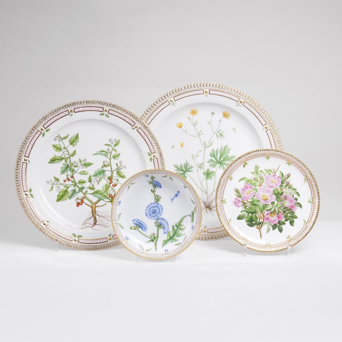 A four part Flora Danica Set of 3 round Platters and Bowl