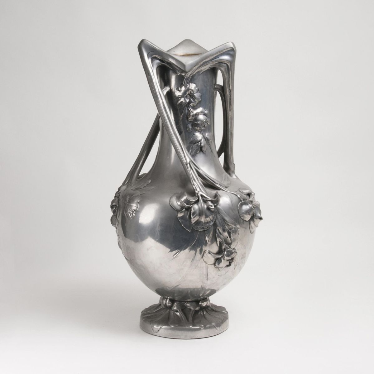 An imposing Art Nouveau Pewter Vase with Floral Decor