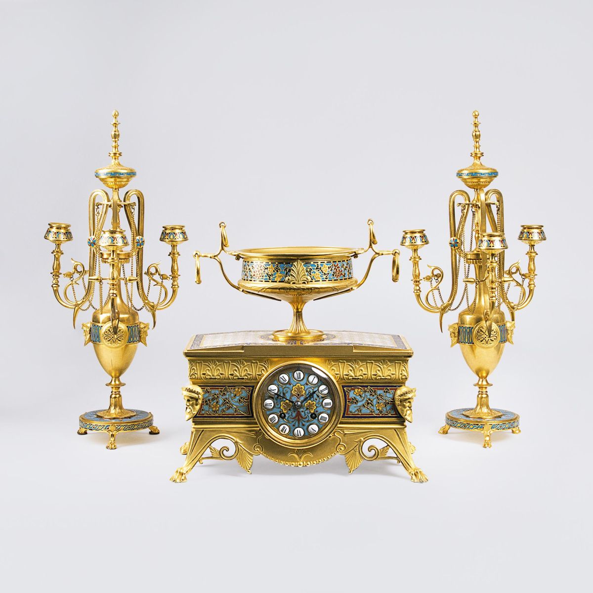 Maison F. Barbedienne, gegr. Paris 1834, tätig bis 1954 - A rare Napoléon III. Fireplace Set with fine Cloisonné Ornaments: Pendule, Bowl and Pair of Candle Holders A rare Napoléon III. Fireplace Set with fine Cloisonné Ornaments: Pendule, Bowl and Pair of Candle Holders