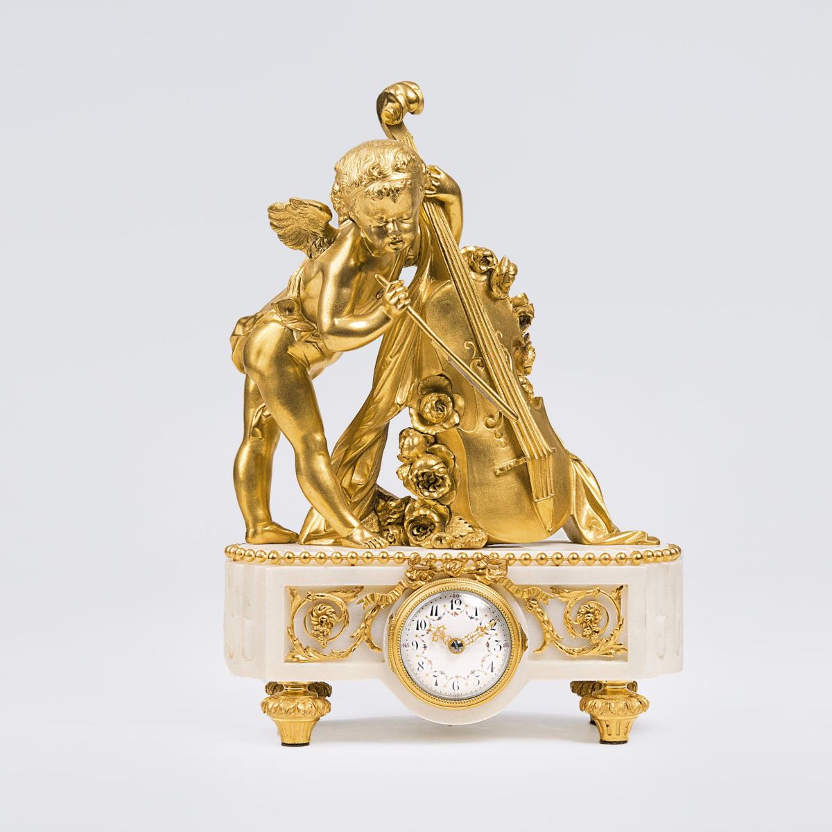 A Napoléon III Pendule 'Putto playing Music' A Napoléon III Pendule 'Putto playing Music'