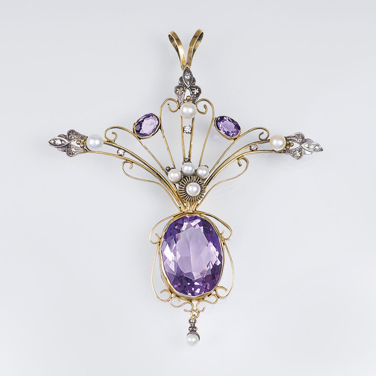 A delicate Art Nouveau Amethyst Pearl Brooch