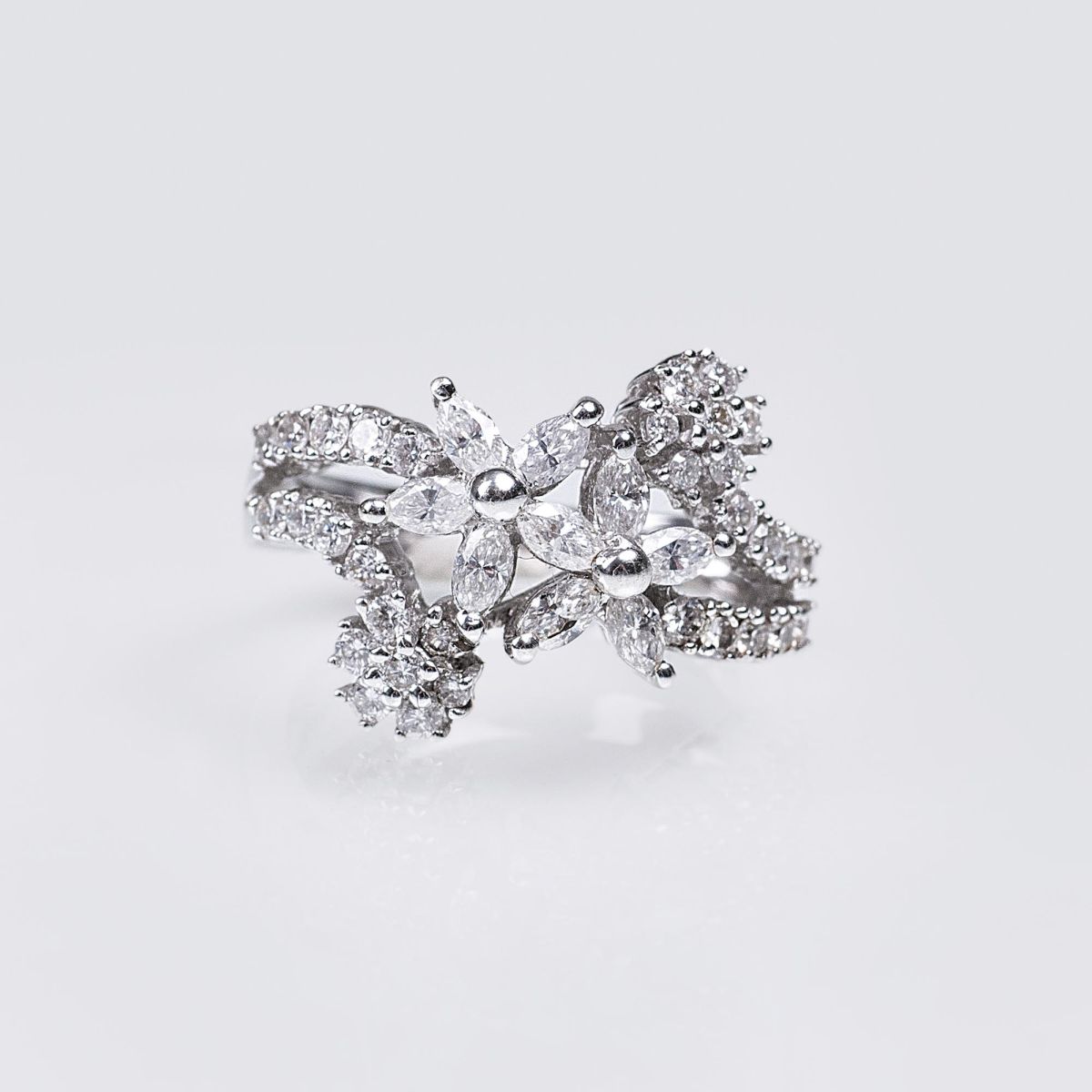 A Diamond Ring with Flower Ornaments A Diamond Ring with Flower Ornaments