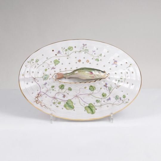 A reticulated Flora Danica Lid/Colander with Trout Handle