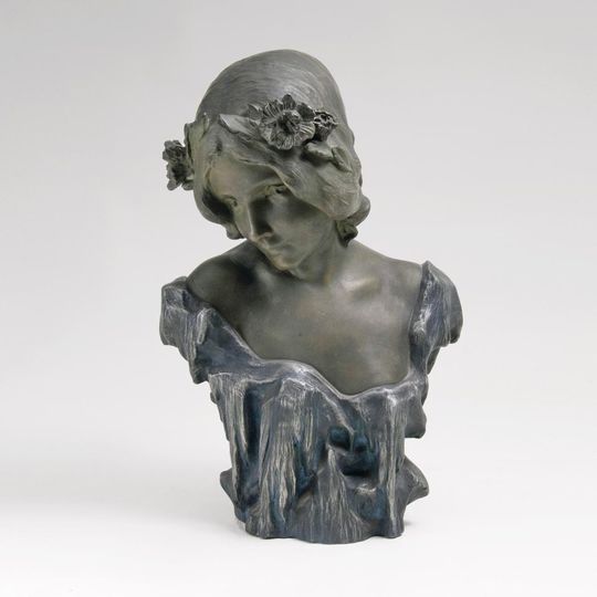 An Art Nouveau Bust of a Nymph with Flowers in the Hair