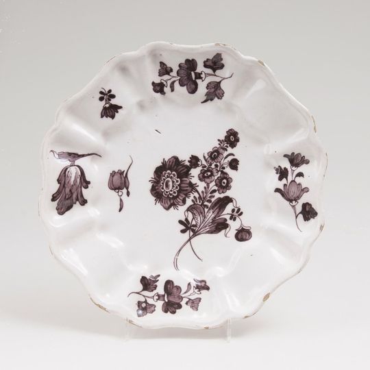 A Faience Plate with Manganese Flower Painting
