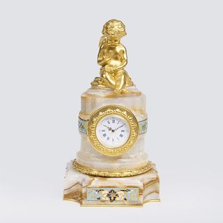 Kleine Alabaster Säulen-Uhr mit Putto