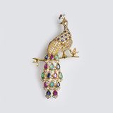 A Vintage Brooch with Diamonds and Coloured Gemstones
