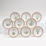 A Set of 9 small and deep Flora Danica Bread Plates with Botanical Specimens