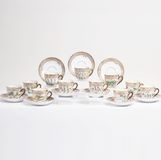 A Set of 11 Flora Danica Moccha Cups with 12 Saucers