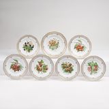 A Set of 7 Reticulated Plates with Fruits