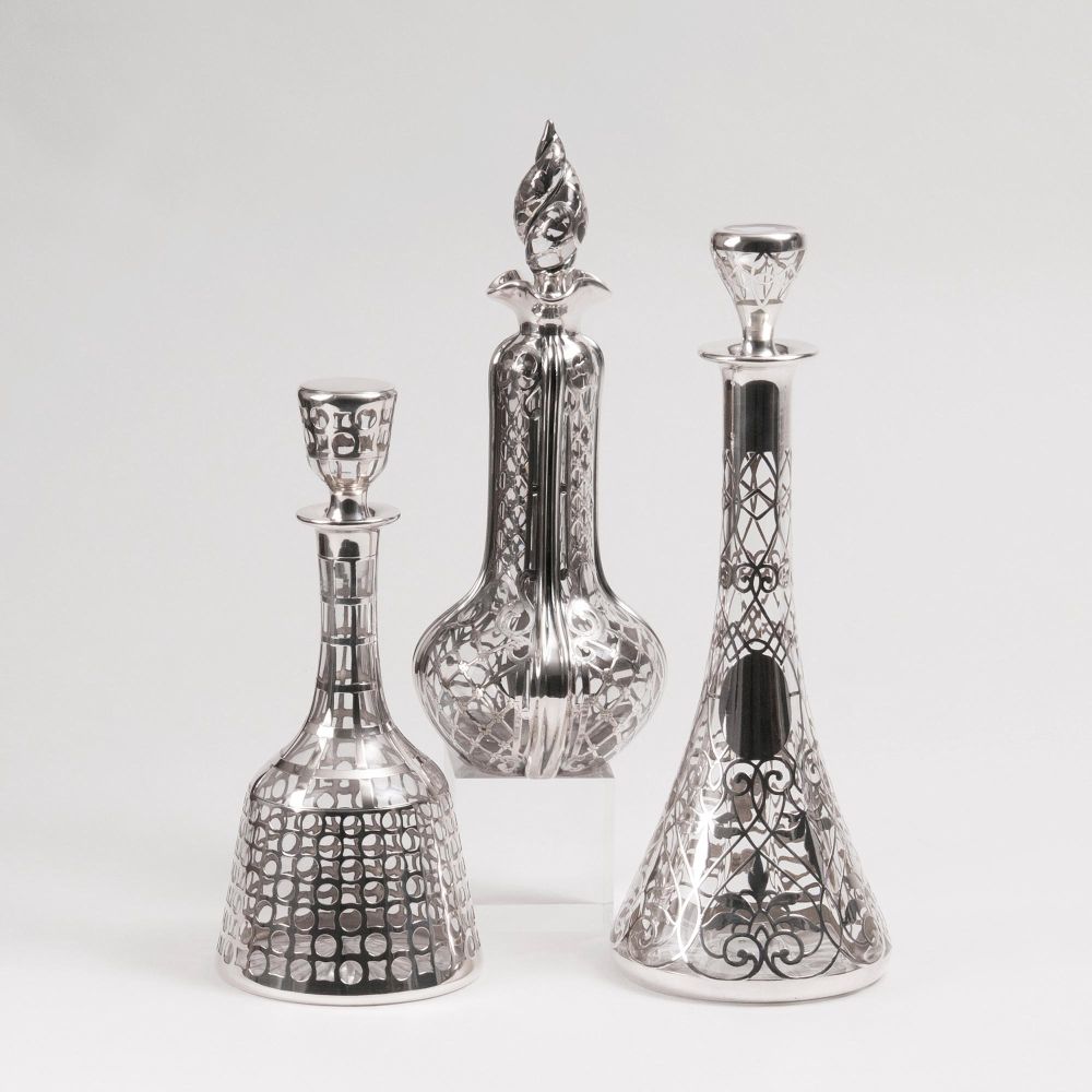 Three Art Nouveau Liquor Carafes with Silver Overlay