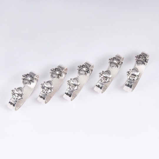 A Set of 11 Napkin Rings 'Acorn'