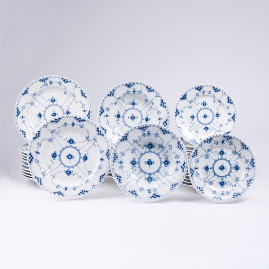 A Set of 36 Plates 'Musselmalet Blue Fluted Full Lace'