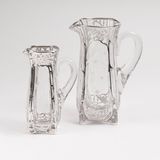 Two Art Nouveau Glass Cans with floral Silver Overlay