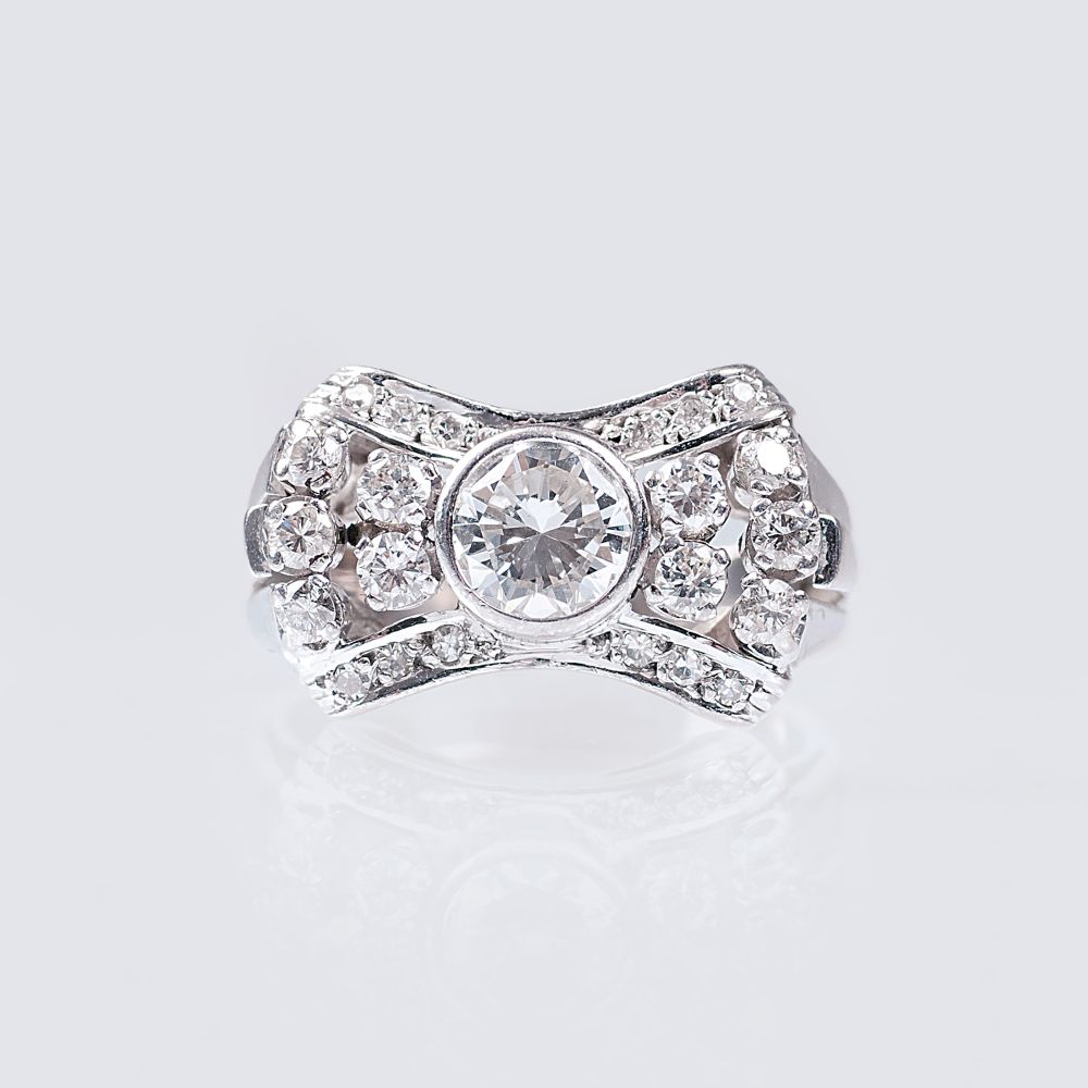 A Vintage Diamond Ring with central Solitaire Diamond