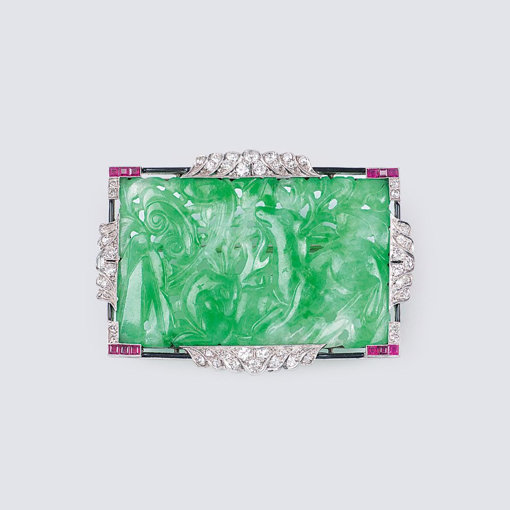 An Art-déco Jade Brooch with Diamonds and Rubies An Art-déco Jade Brooch with Diamonds and Rubies