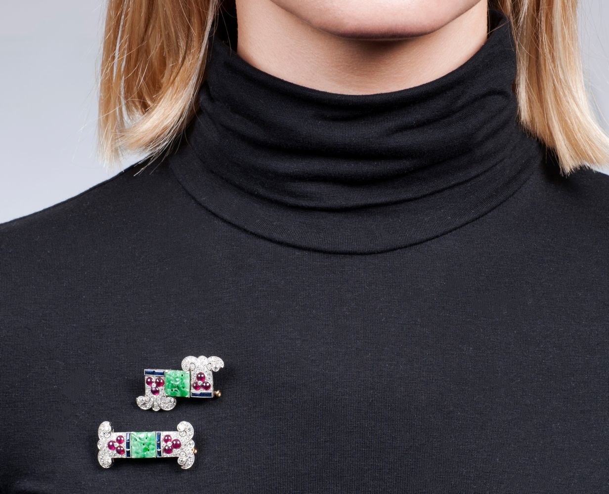 A Pair of Art-déco Diamond Clipbrooches with Rubies, Sapphires and Jade - image 2