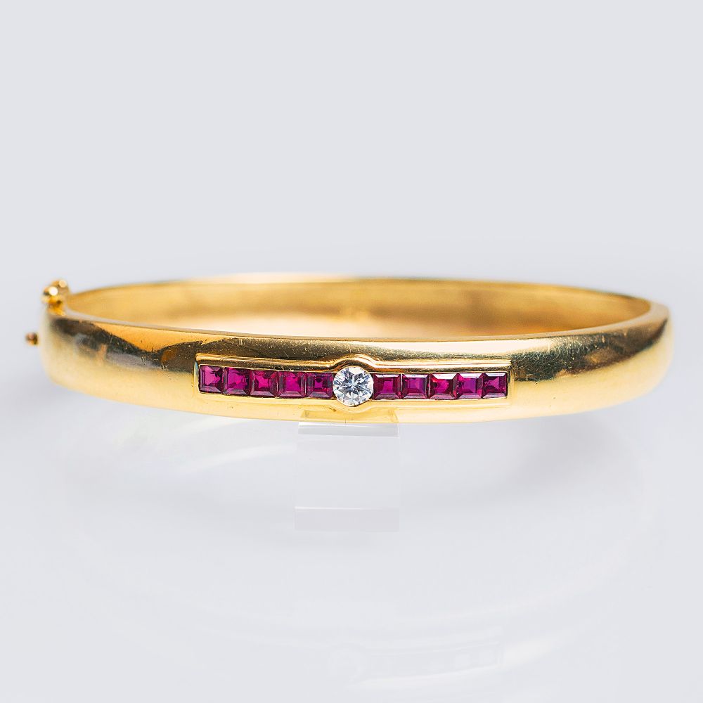 A Gold Bangle Bracelet with rubies and diamond