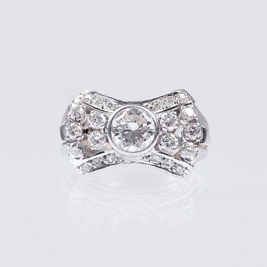 A Vintage Diamond Ring with central Solitaire Diamond