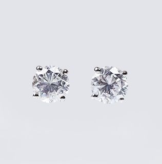 A Pair of fine, white Solitaire Diamond Earstuds