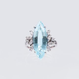 An Aquamarine Diamond Ring