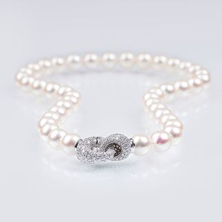 A Pearl Necklace with Diamond Clasp