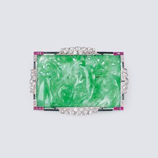 An Art-déco Jade Brooch with Diamonds and Rubies