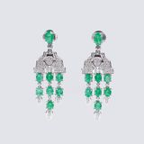 A Pair of Emerald Diamond Earpendants in Art-déco Style - image 1