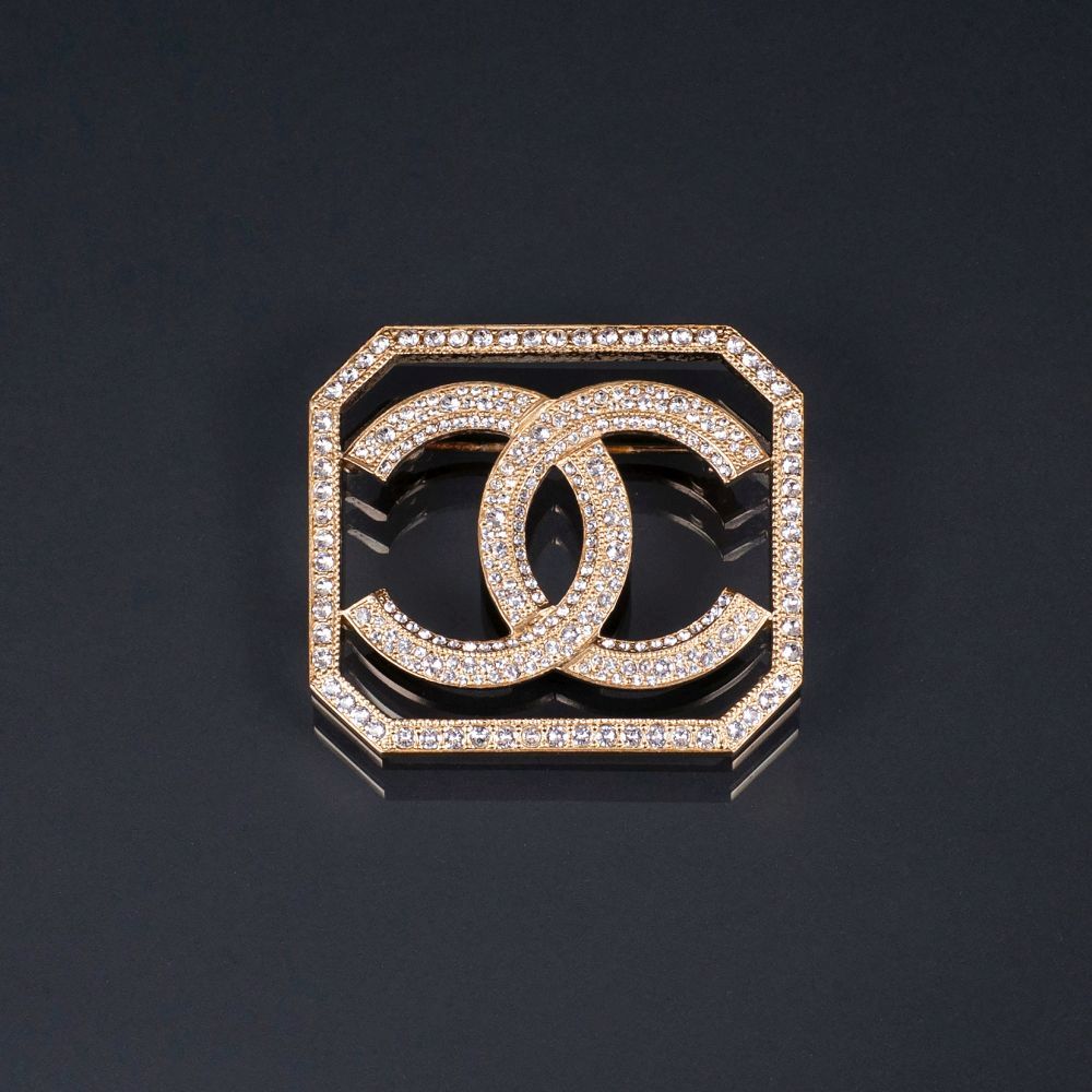 An Icon Brooch with Strass 'CC'