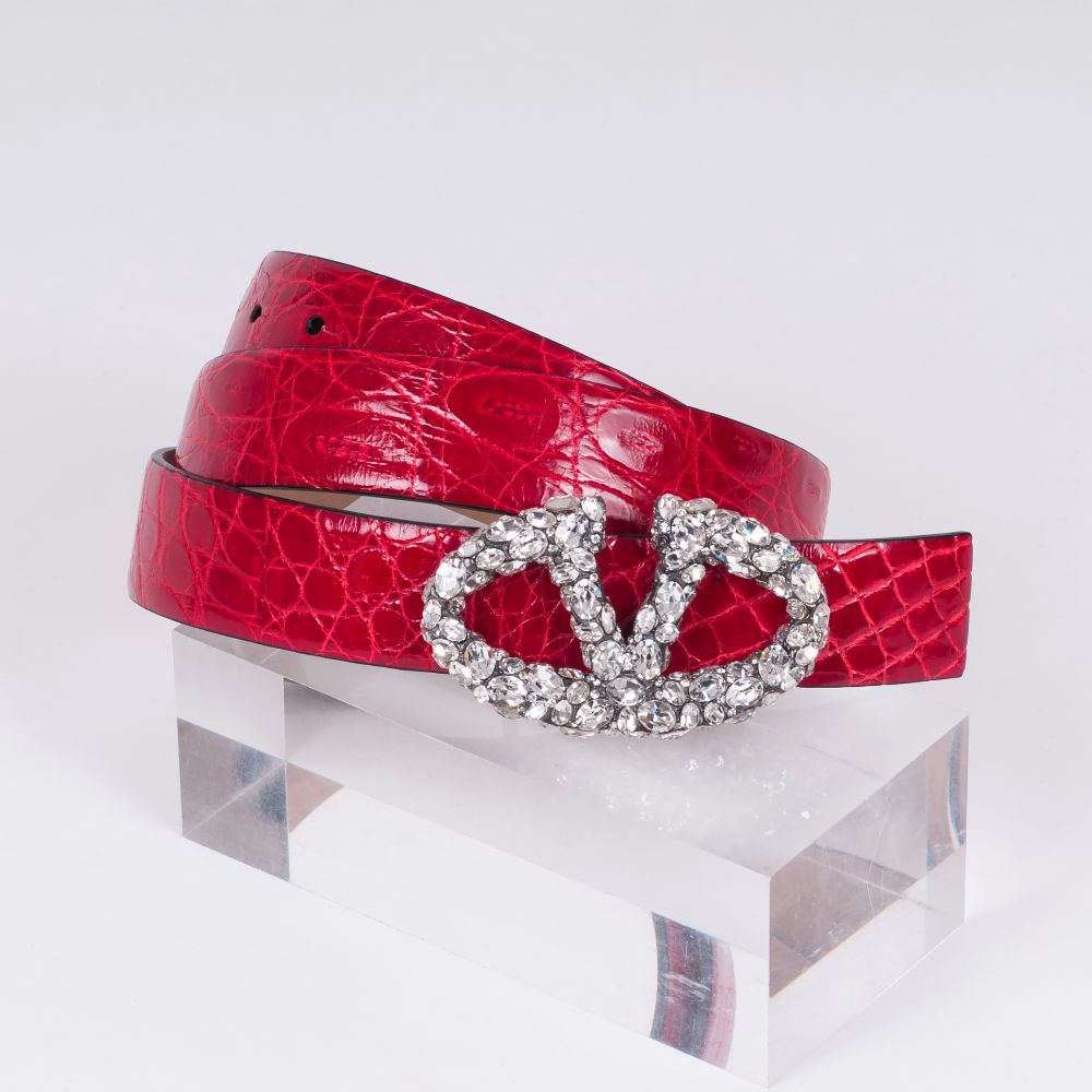 Valentino Garavani - A red Leather Belt with Swarovski Emblem Clasp A red Leather Belt with Swarovski Emblem Clasp