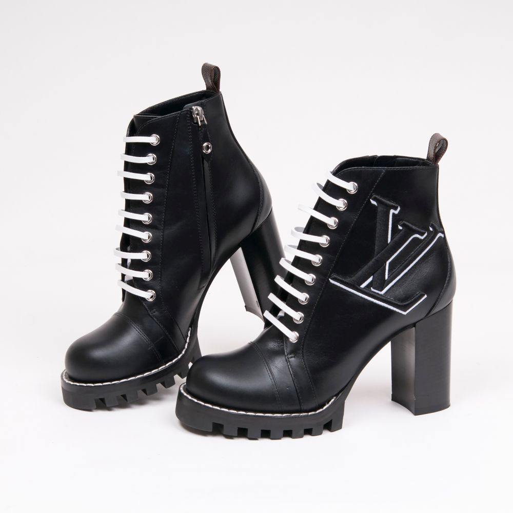 Louis Vuitton - A Pair of Laced Star Trail Ankle Boots A Pair of Laced Star Trail Ankle Boots