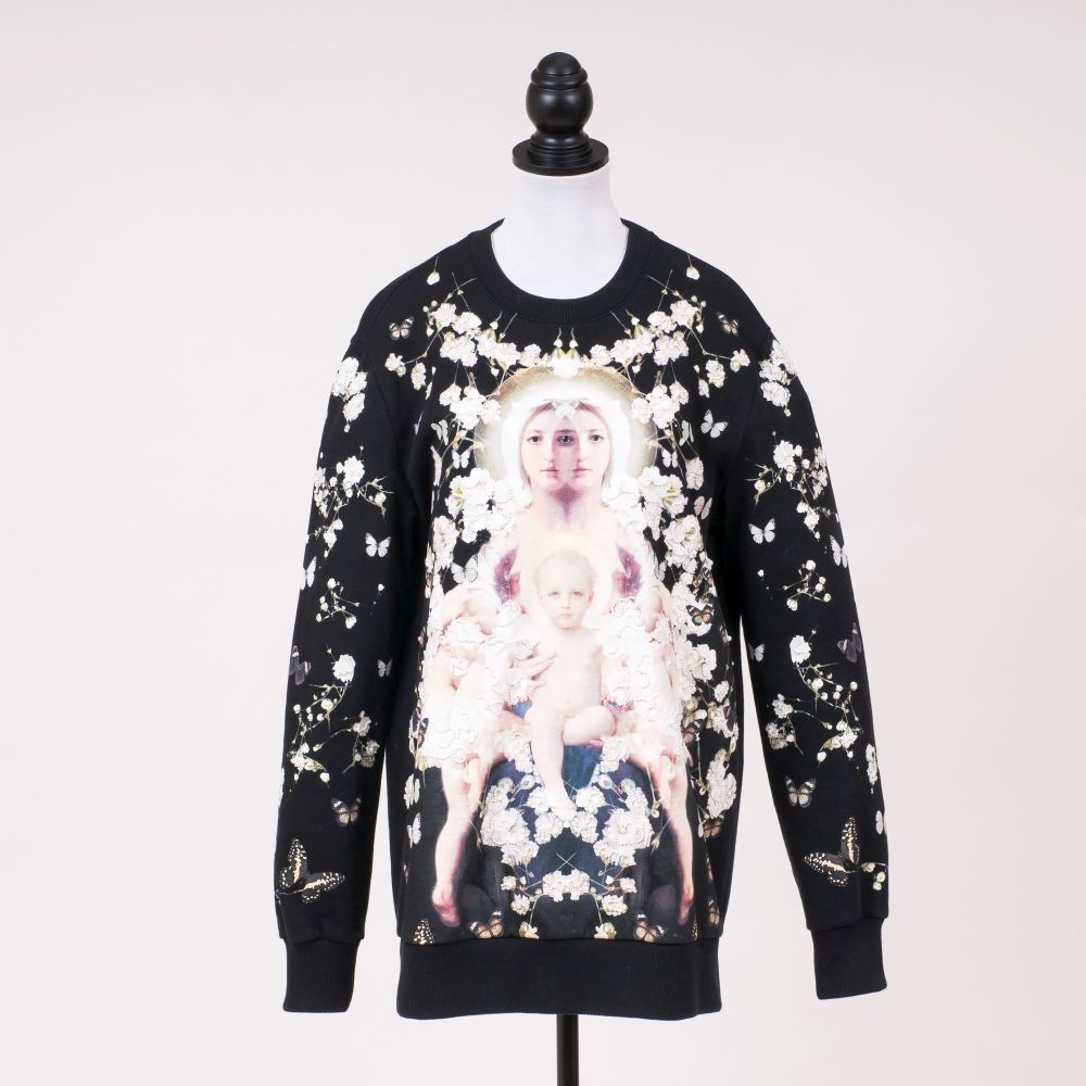 An Oversize Madonna Baby's Breath Sweater