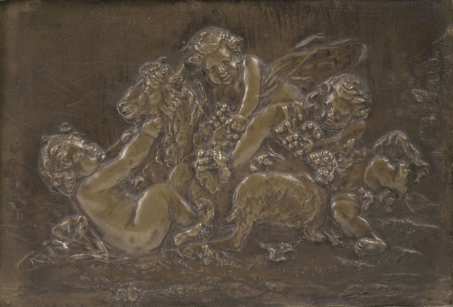 A Bronze relief 'Bacchanal' in the style of Clodion