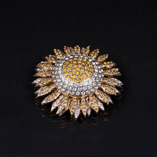 A Sun Brooch with two-coloured Swarovski Crystals