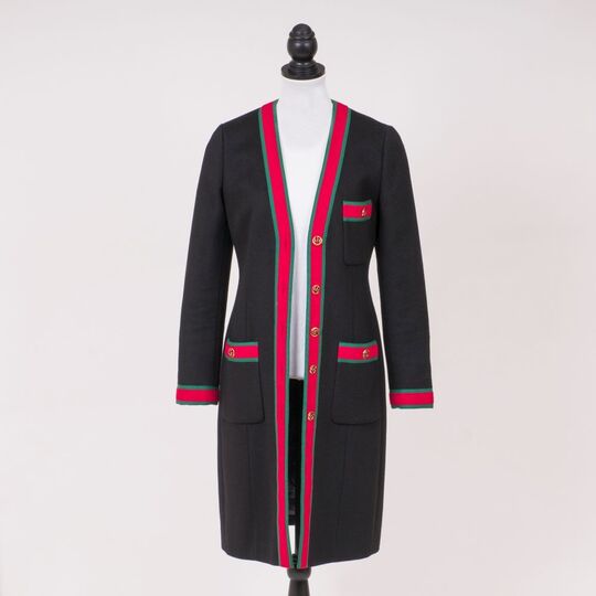 A Black wool coat with red-green ribbons