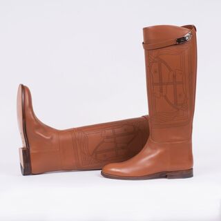 A Pair of Naturel Jumping Boots with Motives of Horses