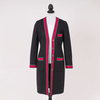 A Black wool coat with red-green ribbons