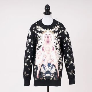 An Oversize Madonna Baby's Breath Sweater