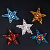 A Set of 5 sparkling Star Brooches 'Rive Gauche' - image 2