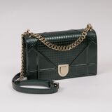 A Diorama Clutch in Metallic-Green