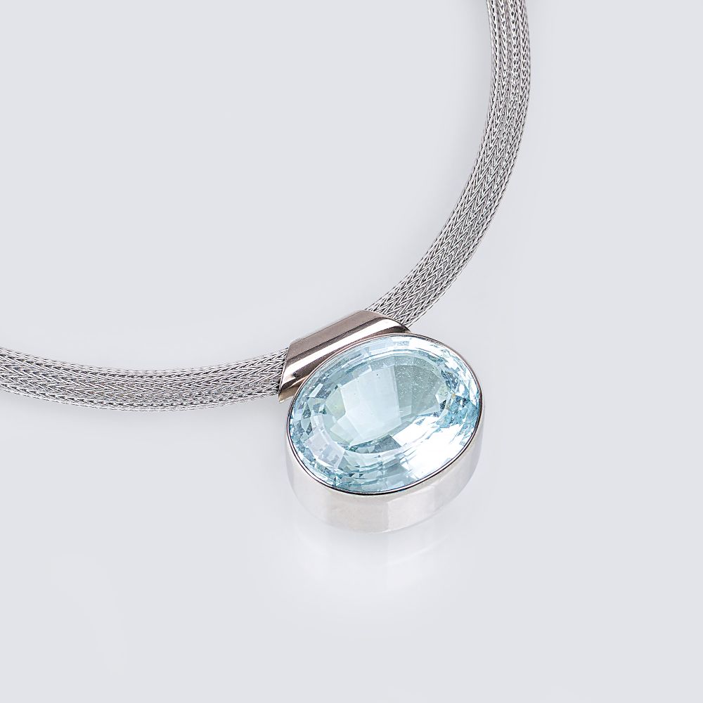 A large Aquamarine Pendant on Necklace