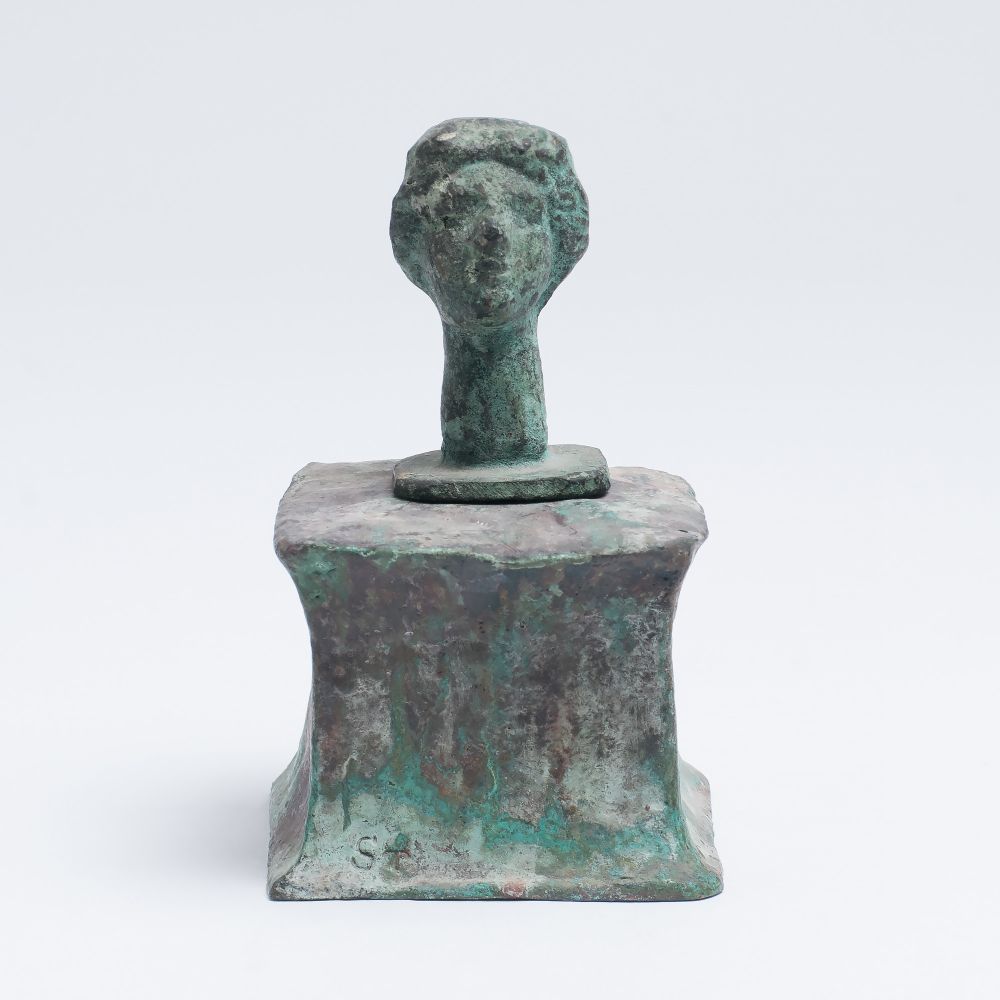 An antique Style Woman's Head on Pedestal