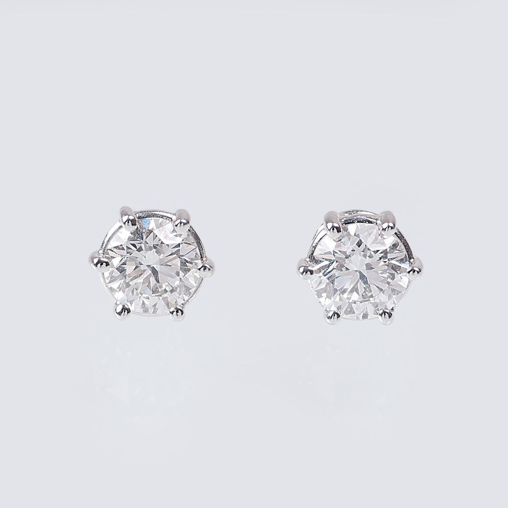 A Pair of Exceptional White Solitaire Earstuds