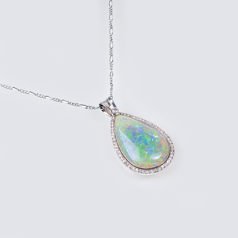 An Art Nouveau necklace with opal diamond pendant