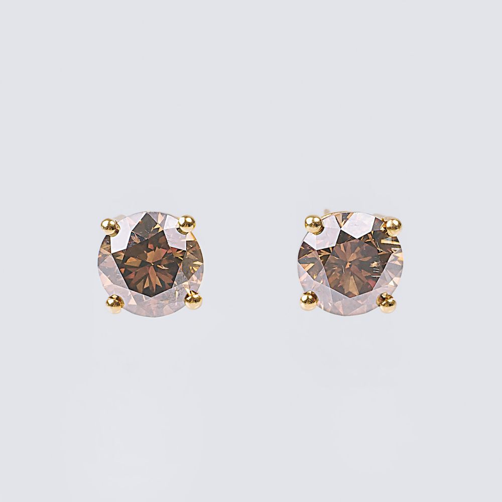 A Pair of Fancy Diamond Solitaire Earrings