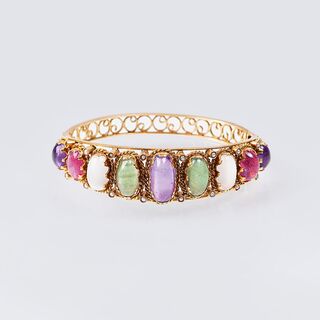 A Vintage Golden Bangle Bracelet with Coloured Stones